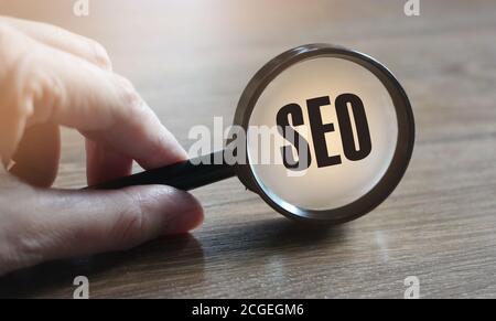 Focused on SEO concept. Businessman is focused to improve SEO and web traffic Stock Photo