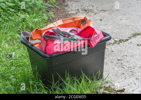 Various recycling containers and bags after the weekly domestic rubbish collection round. For domestic recycling, household waste management Stock Photo