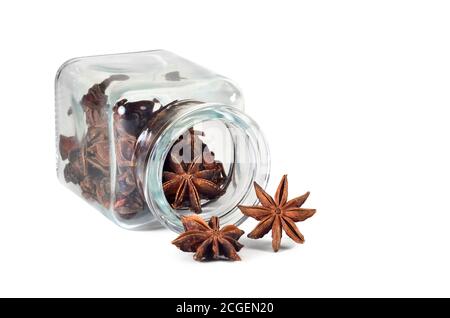 Spice. Anise. Badian in a jar for spices on a white background. Isolated, closeup. Stock Photo