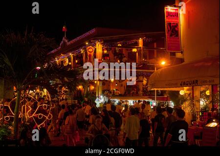 Street scene of 5th Avenue at night with the La Parrilla Mexican Restaurant in Playa del Carmen on the Riviera Maya near Cancun in the state of Quinta Stock Photo