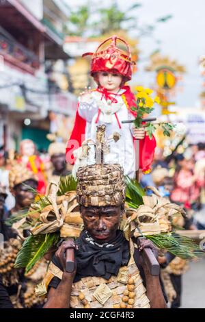 A reveler in costume during the Ati-atihan Festival in Kalibo, Aklan, Philippines. The event is held every third Sunday of January. Stock Photo