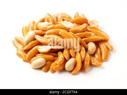 crispy rice crackers with roasted peanuts placed on a white background Stock Photo