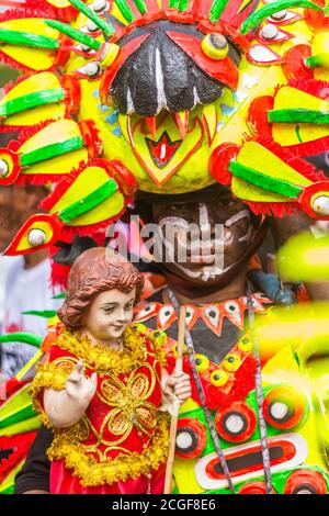 A reveler in costume during the Ati-atihan Festival in Kalibo, Aklan, Philippines. The event is held every third Sunday of January. Stock Photo