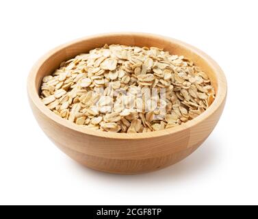 Close up of oatmeal in a wooden bowl set against a white background Stock Photo