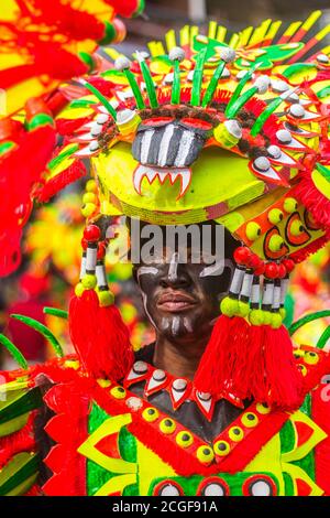 A reveler in costume during the Ati-atihan Festival in Kalibo, Aklan, Philippines. The event is held every third Sunday of January. Stock Photo