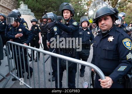 Los Angeles, CA, USA. 20th Nov, 2009. Students and police officers face off during a protest against a 32 percent tuition increase at the University o Stock Photo