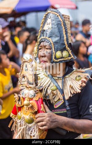 A reveler in costume during the Ati-atihan Festival in Kalibo, Aklan, Philippines. The event is held every third Sunday of January. Stock Photo