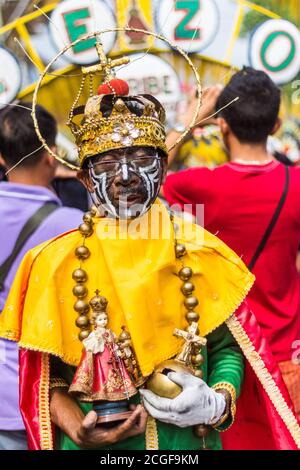 A reveler in costume during the Ati-atihan Festival in Kalibo, Aklan, Philippines. The event is held every third Sunday of January. Stock Photo