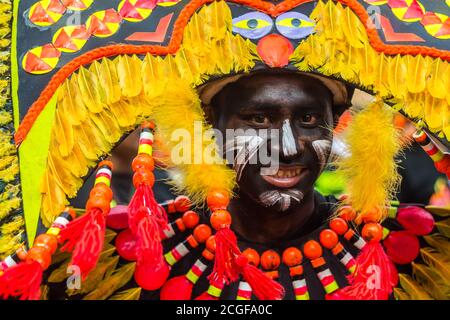 A reveler in costume during the Ati-atihan Festival in Kalibo, Aklan, Philippines. The event is held every third Sunday of January. Stock Photo