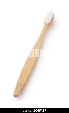 Bamboo toothbrush on a white background Stock Photo