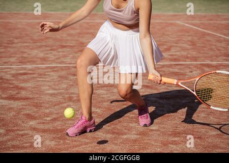 Female tennis player (professional) with dress riding up showing underwear.  (Accredited photographer Stock Photo - Alamy