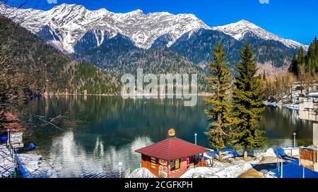 Lake Ritsa in the Caucasus Mountains, in the north-western part of Abkhazia, surrounded by mixed mountain forests and subalpine meadows. Stock Photo