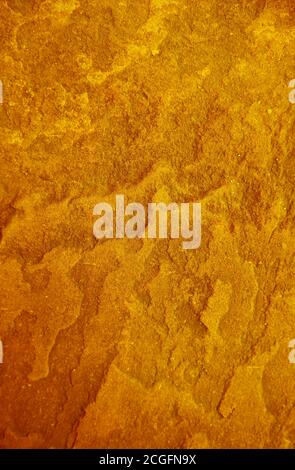 Pop art style gold colored rough stone's surface texture Stock Photo