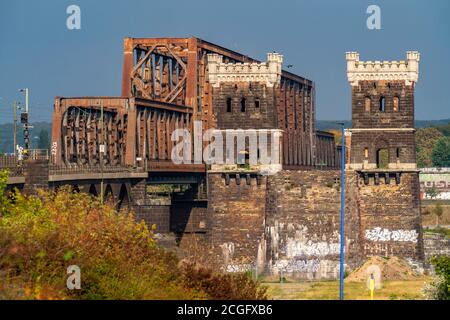 Railroad bridge over the Rhine near Duisburg-Rheinhausen, old bridge towers, Duisburg, NRW, Germany Stock Photo
