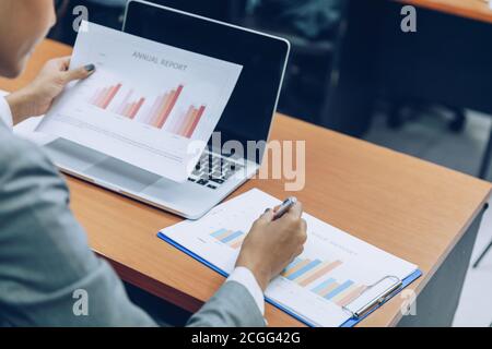 Business people are summarizing the performance of the enterprise Stock Photo