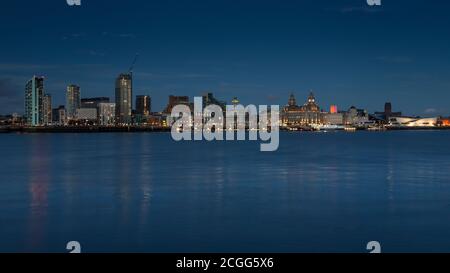 Liverpool skyline and River Mersey at twilight, Merseyside, England Stock Photo