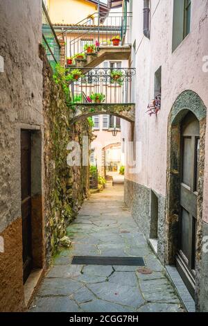 Gandria village alley vertical view with colorful houses in Gandria Lugano Ticino Switzerland