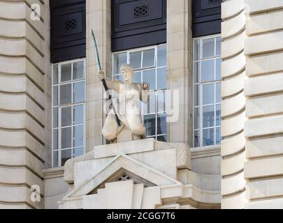 London, England, UK. Sculpture:'The Hero' by Ernest Cole, sculptor. 1921. Portland stone. on the West facade of County Hall on the South Bank Stock Photo