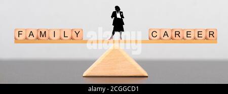 Business woman must choose between family and career Stock Photo