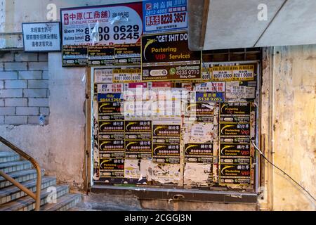 Hong Kong, Hong Kong, China. 11th Sep, 2020. Hong Kong retail sector is in crisis. With the Covid-19 pandemic coming close on the heals of the Hong Kong protests, the lack of customers has taken its toll. Many shops like those on the mid-levels escalators are shuttered, covered in posters and estate agent banners and graffiti. Credit: Jayne Russell/ZUMA Wire/Ģ����ý Live News Stock Photo