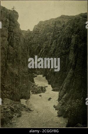 . The state of Wyoming, a book of reliable information published by authority of the eighth Legislature . Grand Canon of North Platte River, Natrona County. State Lands. 73 WHAT HAS BEEN DONE. Under the arid land act the State of Wyoming has segre-gated and contracted for the reclamation of 556,593.39 acres. The first segregation for the Cody Canal, by the ShoshoneIrrigation Company, comprised 26,429.94 acres. This land islocated near the town of Cody, in Big Horn County. Thecanal takes its water supply from the South Fork of the Sho-shone River, and the state has obtained patent from the gov- Stock Photo