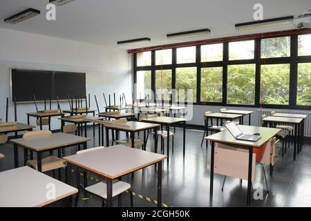 Busto Arsizio, Italy. 11th Sep, 2020. Italy, Busto Arsizio School reopening and preparation of classrooms with spacing of desks and various safety measures In the photo: classroom with safe positioning of desks Credit: Independent Photo Agency/Alamy Live News Stock Photo