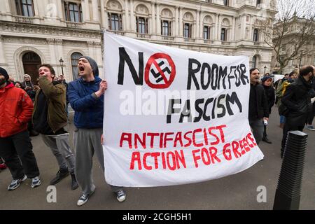 Anti fascist protesters, demonstrating against a first rally by the newly formed UK Branch of Pegida (Patriotic Europeans Against the Islamisation of the West). The Pegida rally was to protest against what they say is Islamisation of Britain. Less than100 people came out to support Pegida rally they where heavily out numbered by an anti Pegida protesters. Pegida started in Dresden Germany in October 2014, Patriotic Europeans Against the Islamisation of the Occident (German: Patriotische Europäer gegen die Islamisierung des Abendlandes), abbreviated Pegida, is a pan-European, anti-Islam, far-ri Stock Photo