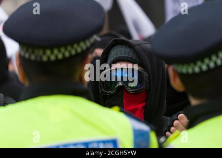 Anti fascist protesters, demonstrating against a first rally by the newly formed UK Branch of Pegida (Patriotic Europeans Against the Islamisation of the West). The Pegida rally was to protest against what they say is Islamisation of Britain. Less than100 people came out to support Pegida rally they where heavily out numbered by an anti Pegida protesters. Pegida started in Dresden Germany in October 2014, Patriotic Europeans Against the Islamisation of the Occident (German: Patriotische Europäer gegen die Islamisierung des Abendlandes), abbreviated Pegida, is a pan-European, anti-Islam, far-ri Stock Photo