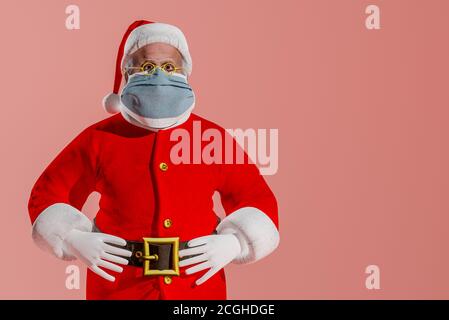 Santa Wearing medical Mask Christmas Covid-19 Social Distancing Quarantine Greeting. 3D Illustration Stock Photo