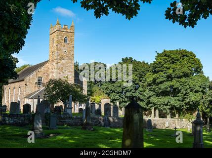 Tranent Parish Church, built 1800, and old graveyard on a sunny day, East Lothian, Scotland, UK Stock Photo