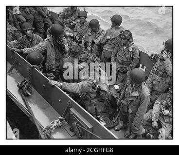 D-Day WW2 invasion glider pilots and support troops returning after successfully and courageously flying and landing troops behind enemy lines. Returning across the channel on troop landing craft 1944 Operation Overlord D-Day World War II Second World War Stock Photo