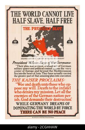 Vintage 1900’s Propaganda Poster ‘The World Cannot Live Half Slave, Half Free. The Prussian Blot’: 100,000,000 People Already Enslaved By Germany. This poster was published by the American State Council of Defense. It displays a pointed threat from the Kaiser and a quote from Wilson about the reach of German ambition. (Wilson's statement is from a speech he gave on Flag Day, June 14, 1917.) Poster displays a map of Europe and Turkey with a large red swath denoting the 'Prussian Blot.' Text includes quotations from President Wilson and Kaiser Wilhelm. Stock Photo