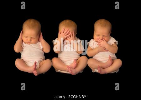 One baby posing three times in the poses of hear see speak no evil Stock Photo