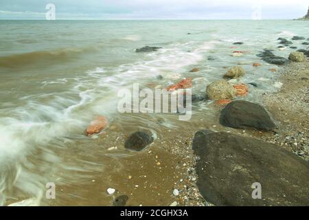 Swirles on the incoming tide at Hunstanton in Norfolk, UK. Stock Photo