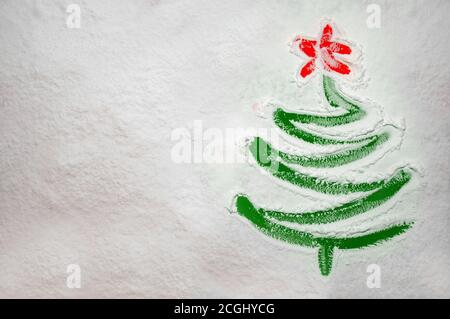 Christmas Tree Drawn On The Scattered Flour Colored In Trendy Color Of Year 2022 Very Peri. Minimal Holiday Concept Stock Photo - Alamy