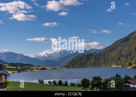 Superb panoramic view of Lago della Muta with the snowy Mount Ortles in the background, South Tyrol, Italy Stock Photo