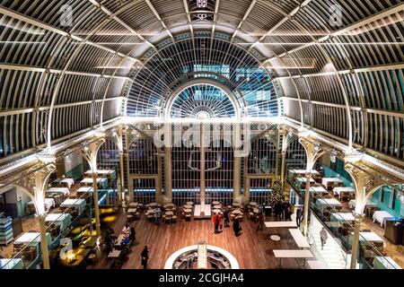 Interior of the Paul Hamlyn Hall (Floral Hall) at the Royal Opera House restaurant and bar, Covent Garden, London, UK Stock Photo