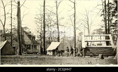 . The photographic history of the Civil War : in ten volumes . ONION SOLDIERS AT WORK TO PRESERVE THEIR HEALTH. The soldier in the field had to learn to take eare of his health between battles as well as to save his skin while the bullets were flying.In these two photographs, separated by only a few moments, Union men appear at the work of sanitation. Huts are being erectedand ditches dug for drainage near the headquarters of General George W. Getty, Sixth Army Corps. In the upper photograph theman with the wheelbarrow is just starting away from the tent with a load. In the lower, he has reach Stock Photo