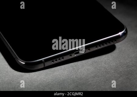 iphone xs max audio interface on black background Stock Photo