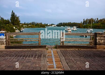 Somerset Bridge, 22' wide, world's smallest drawbridge, hinged wood, boats anchored, water, marine scene, Ely's Harbour, Somerset Island; Bermuda Stock Photo