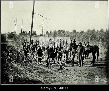 . Original photographs taken on the battlefields during the Civil War of the United States . PONTOON BOATS ON WHEELS BUILDING A CORDUROY ROAD Stock Photo