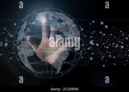 Hand touching global network and data exchanges over the world, Internet network for fast data exchange around planet Earth from space Stock Photo