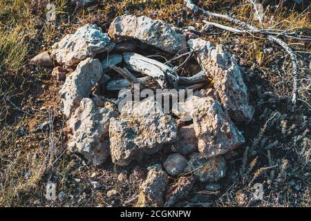 Camp fire rock circle in the mountains Stock Photo