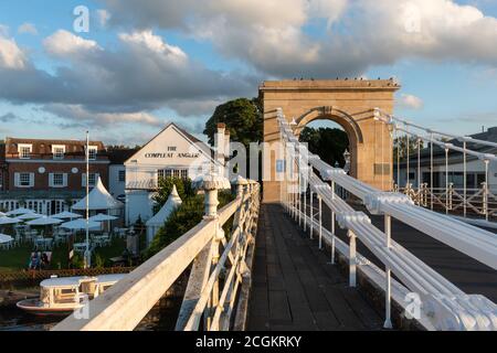 Marlow, a picturesque market town in Buckinghamshire, England, UK, on the River Thames. The suspension bridge and riverside hotel, The Compleat Angler Stock Photo