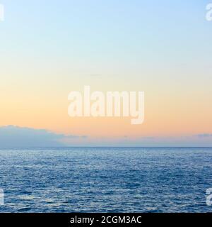 Sea horizon with almost clear sky, may be used as background Stock Photo