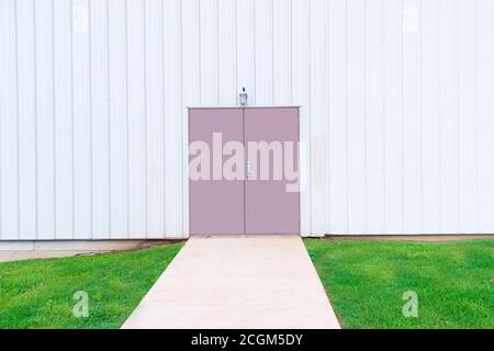 Horizontal shot of a double door in a commercial building with copy space. Stock Photo