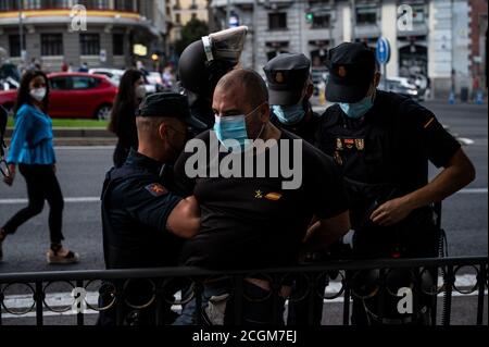 Madrid, Spain. 11th Sep, 2020. Police arresting a supporter of far right wing during a protest against the Blanquerna case coinciding with the celebration of the 'Diada' National Day in Catalonia. Credit: Marcos del Mazo/Alamy Live News Stock Photo