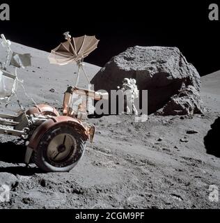 (13 Dec. 1972) --- Scientist-astronaut Harrison H. Schmitt is photographed working beside a huge boulder at Station 6 (base of North Massif) during the third Apollo 17 extravehicular activity (EVA) at the Taurus-Littrow landing site. Stock Photo