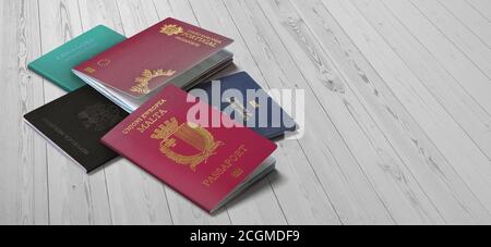 Saint Kitts and Nevis,usa,Malta, Dominica passport on wooden background Stock Photo