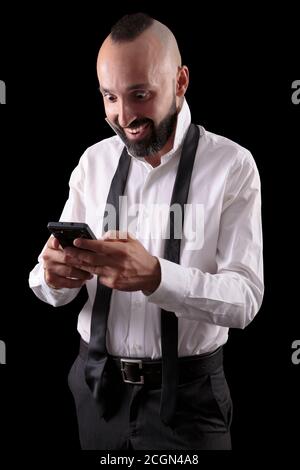 Excited hispanic man gladly surprised by good news Stock Photo